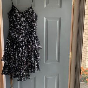A great party dress! Black background with polkadots.